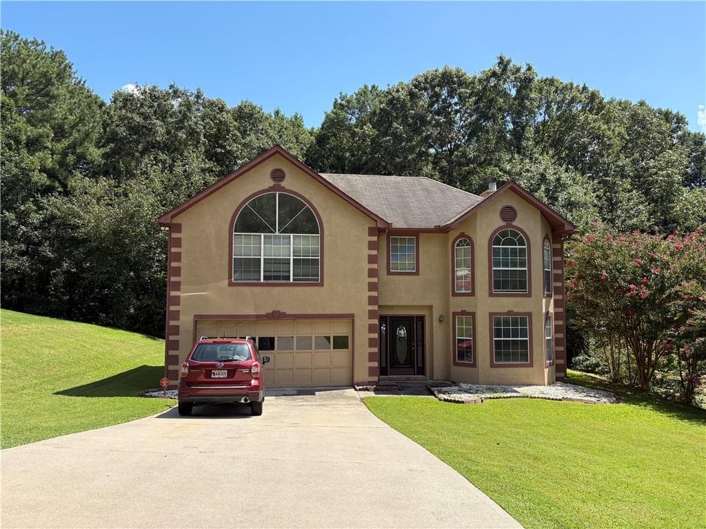 4 bedroom, 3 bathroom, 2,497 sq ft single family residence for sale at 1667 Rolling Stone Drive, Lithonia, GA 30058 — photo 1 of 34