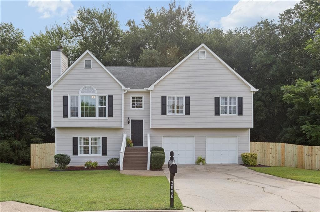 3 bedroom, 2 bathroom, 1,956 sq ft single family residence for sale at 3096 Woodcrest Way, Powder Springs, GA 30127 — photo 1 of 36