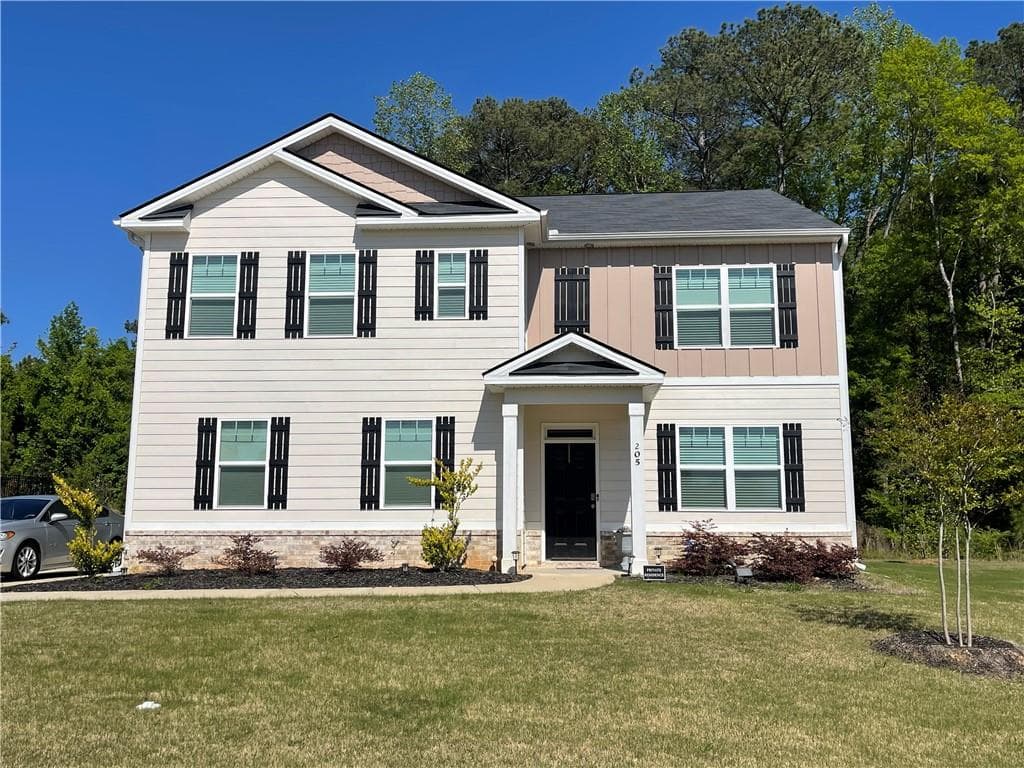 5 bedroom, 3 bathroom, 2,556 sq ft single family residence for sale at 205 Sullivan Street, Hampton, GA 30228 — photo 1 of 50