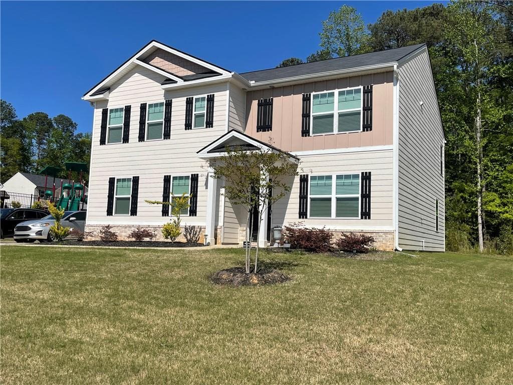 5 bedroom, 3 bathroom, 2,556 sq ft single family residence for sale at 205 Sullivan Street, Hampton, GA 30228 — photo 2