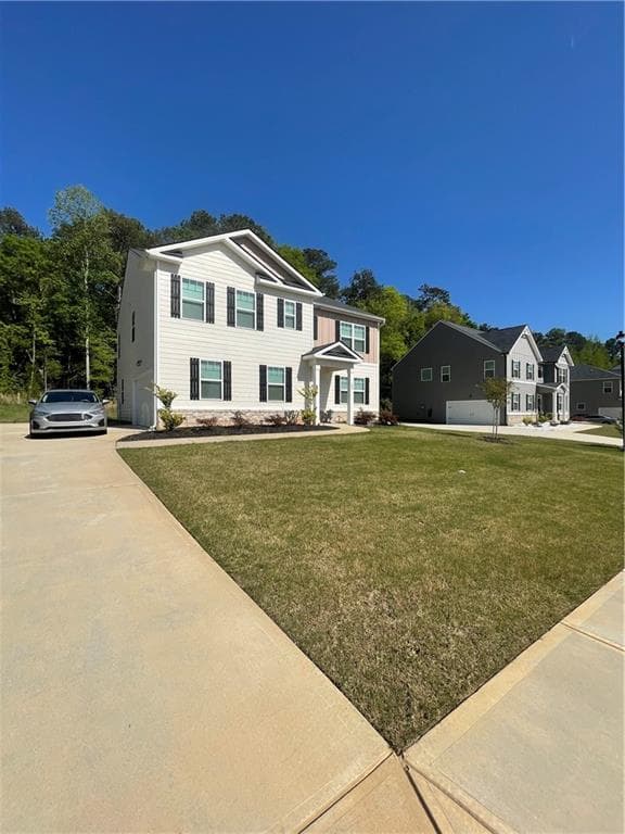 5 bedroom, 3 bathroom, 2,556 sq ft single family residence for sale at 205 Sullivan Street, Hampton, GA 30228 — photo 3