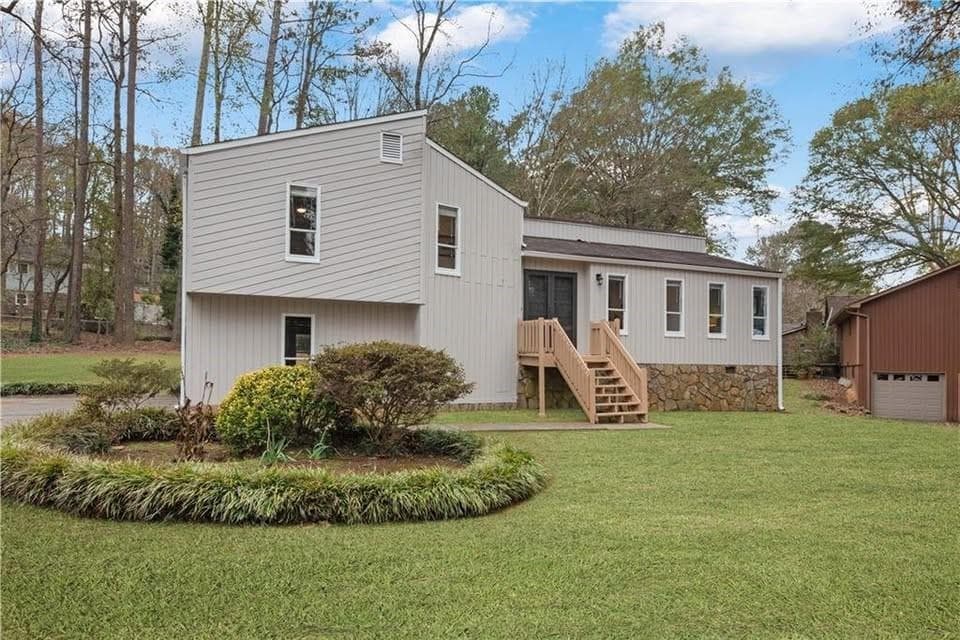 4 bedroom, 2 bathroom, 1,576 sq ft single family residence for rent at 2532 Hidden Hills Dr, Marietta, GA 30066 for $2,299 a month — photo 1 of 11