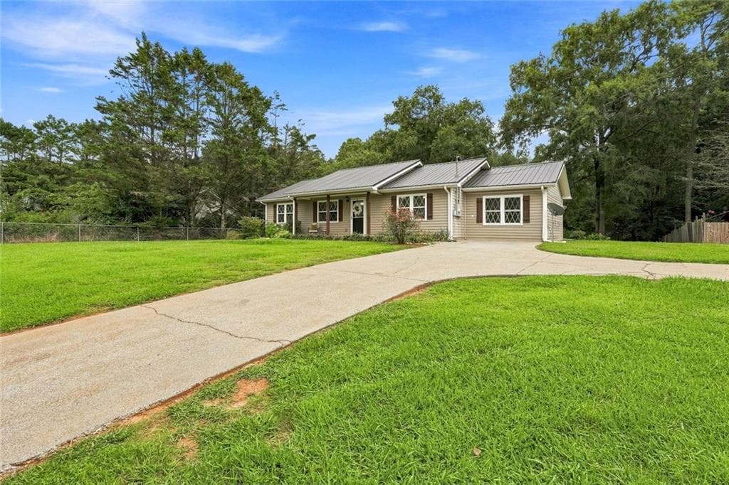 4 bedroom, 2 bathroom, 1,356 sq ft single family residence for sale at 1015 Erwin Hill Church Road, Calhoun, GA 30701 — photo 2