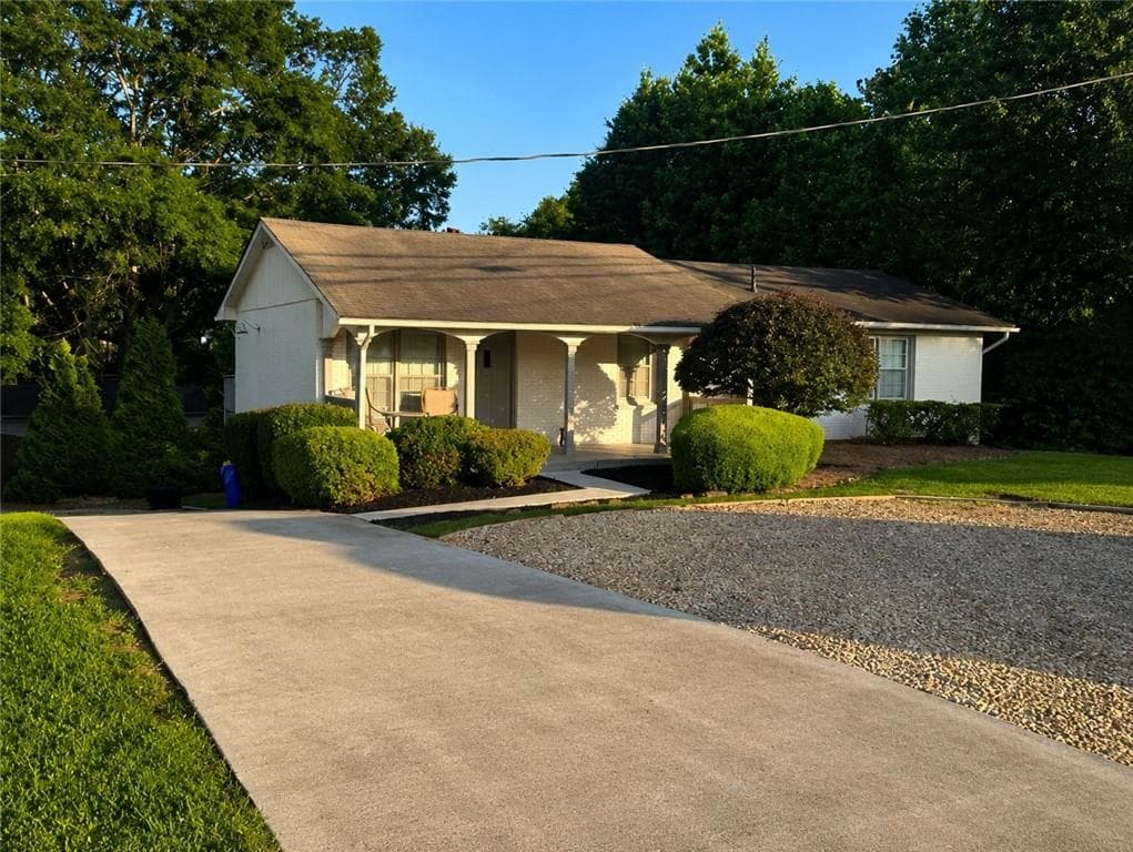 5 bedroom, 3 bathroom, 2,300 sq ft single family residence for sale at 6040 Pine Mountain Road, Kennesaw, GA 30152 — photo 2