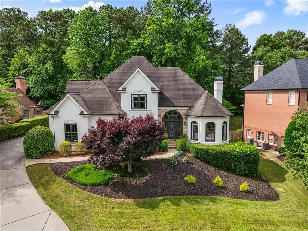 6 bedroom, 5 bathroom, 5,905 sq ft single family residence for sale at 9170 Nesbit Lakes Drive, Roswell, GA 30022 — photo 2