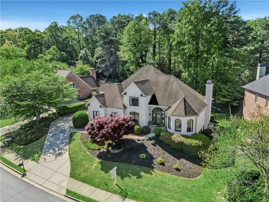 6 bedroom, 5 bathroom, 5,905 sq ft single family residence for sale at 9170 Nesbit Lakes Drive, Roswell, GA 30022