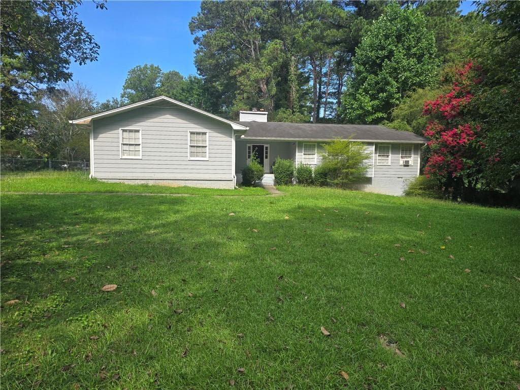 4 bedroom, 3 bathroom, 1,852 sq ft home for sale at 1481 Smithson Drive, Lithonia, GA