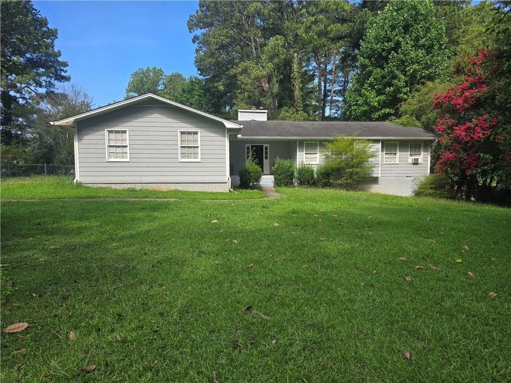 4 bedroom, 3 bathroom, 1,852 sq ft single family residence for sale at 1481 Smithson Drive, Lithonia, GA 30058 — photo 2