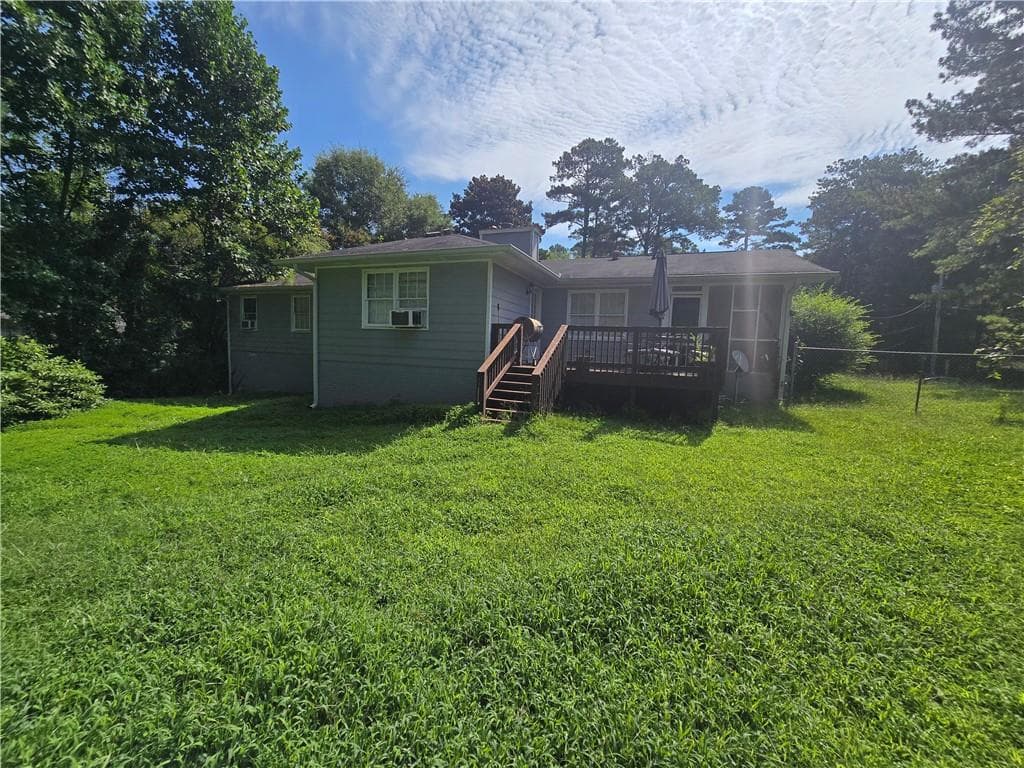 4 bedroom, 3 bathroom, 1,852 sq ft single family residence for sale at 1481 Smithson Drive, Lithonia, GA 30058 — photo 5