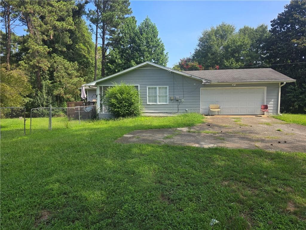 4 bedroom, 3 bathroom, 1,852 sq ft single family residence for sale at 1481 Smithson Drive, Lithonia, GA 30058 — photo 7