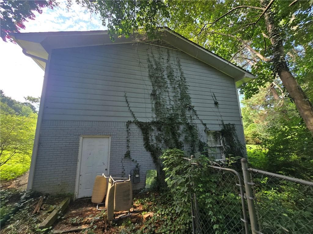 4 bedroom, 3 bathroom, 1,852 sq ft single family residence for sale at 1481 Smithson Drive, Lithonia, GA 30058 — photo 8