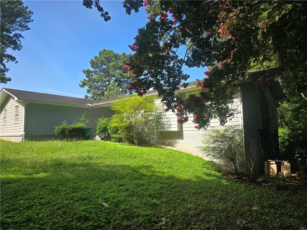 4 bedroom, 3 bathroom, 1,852 sq ft single family residence for sale at 1481 Smithson Drive, Lithonia, GA 30058 — photo 10
