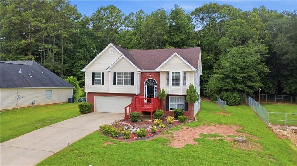 4 bedroom, 3 bathroom, 1,371 sq ft single family residence for sale at 165 Syracuse Lane, Covington, GA 30016 — photo 2