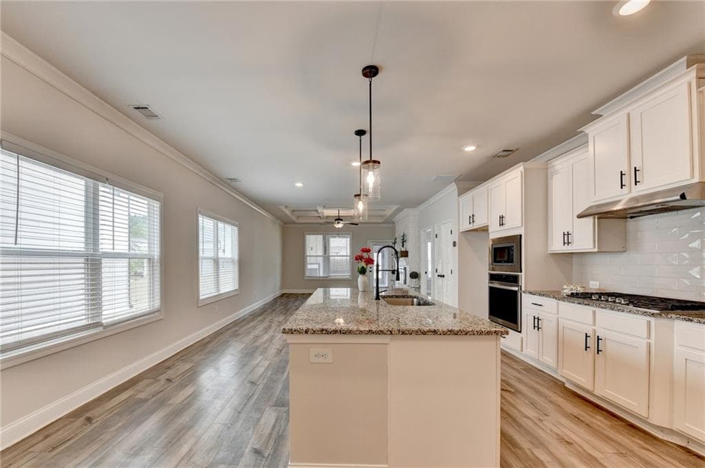 5 bedroom, 4 bathroom, 2,621 sq ft single family residence for sale at 1854 Westfall Landing, Auburn, GA 30011 — photo 6