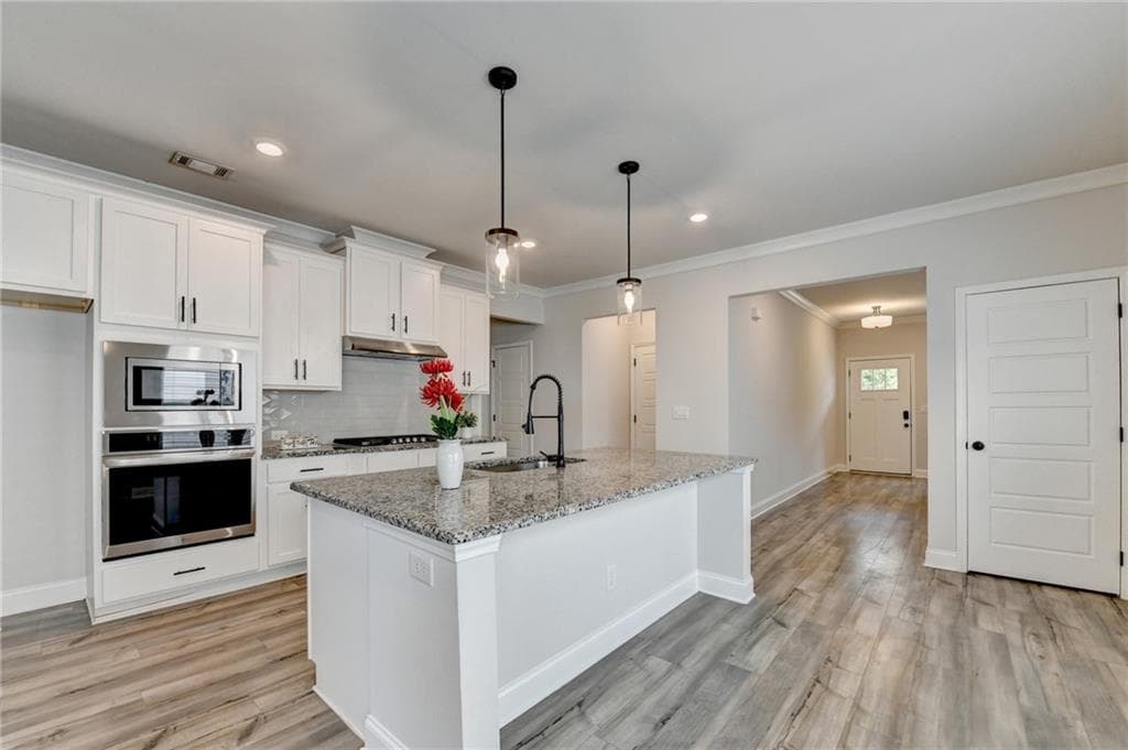 5 bedroom, 4 bathroom, 2,621 sq ft single family residence for sale at 1854 Westfall Landing, Auburn, GA 30011 — photo 9