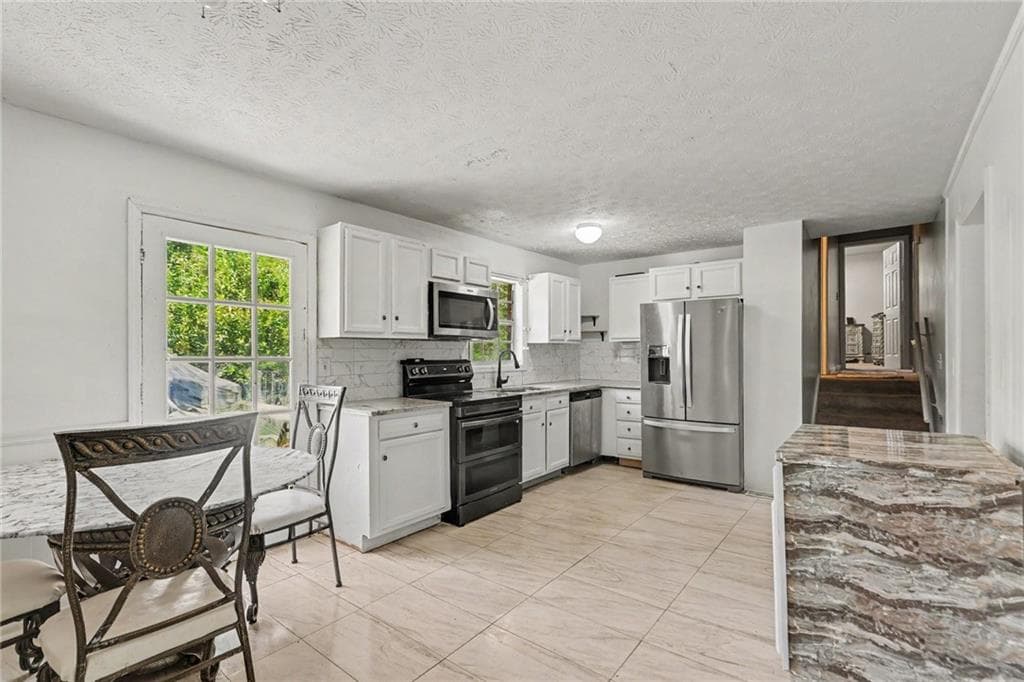 3 bedroom, 2 bathroom, 1,900 sq ft single family residence for sale at 6184 Marilla Street, Douglasville, GA 30135 — photo 5