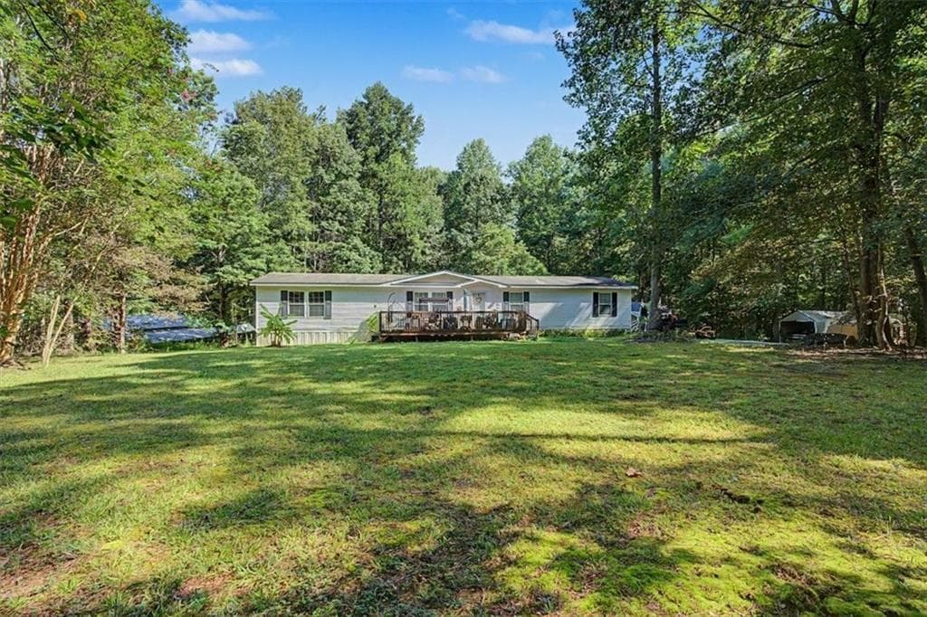 3 bedroom, 2 bathroom single family residence for sale at 10589 Cumming Highway, Canton, GA 30115 — photo 1 of 18