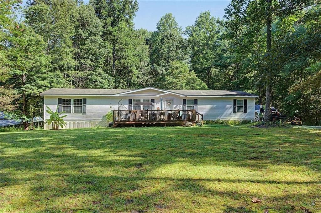 3 bedroom, 2 bathroom single family residence for sale at 10589 Cumming Highway, Canton, GA 30115 — photo 2