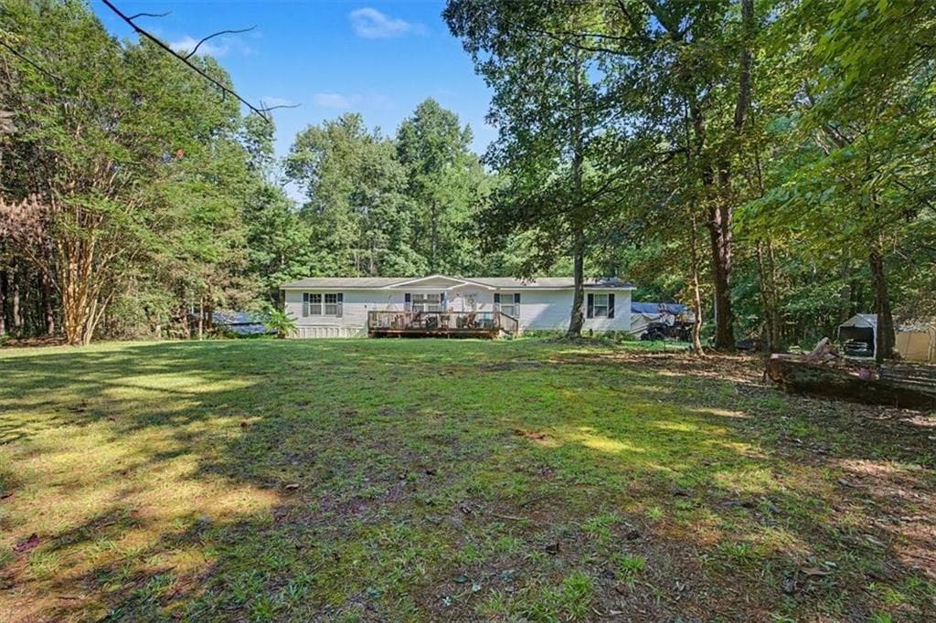 3 bedroom, 2 bathroom single family residence for sale at 10589 Cumming Highway, Canton, GA 30115 — photo 3