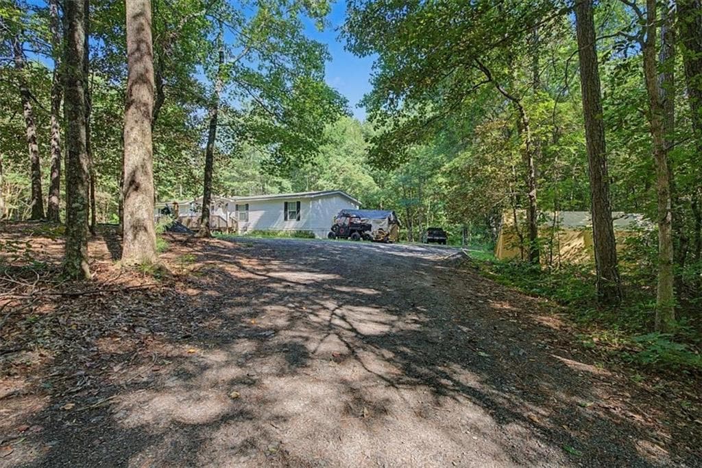 3 bedroom, 2 bathroom single family residence for sale at 10589 Cumming Highway, Canton, GA 30115 — photo 4