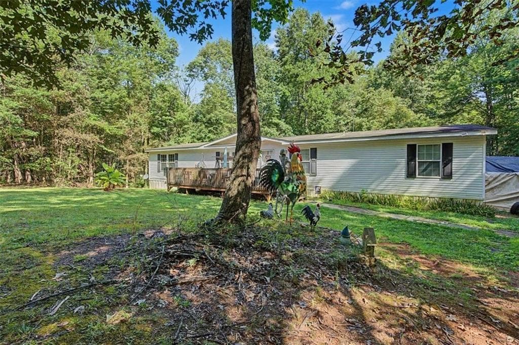 3 bedroom, 2 bathroom single family residence for sale at 10589 Cumming Highway, Canton, GA 30115 — photo 5