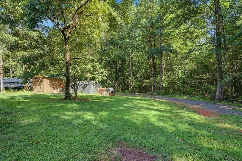 3 bedroom, 2 bathroom single family residence for sale at 10589 Cumming Highway, Canton, GA 30115 — photo 6