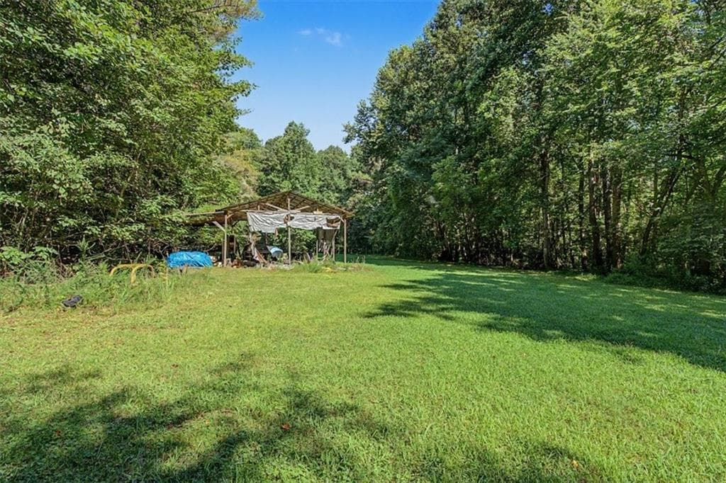 3 bedroom, 2 bathroom single family residence for sale at 10589 Cumming Highway, Canton, GA 30115 — photo 9