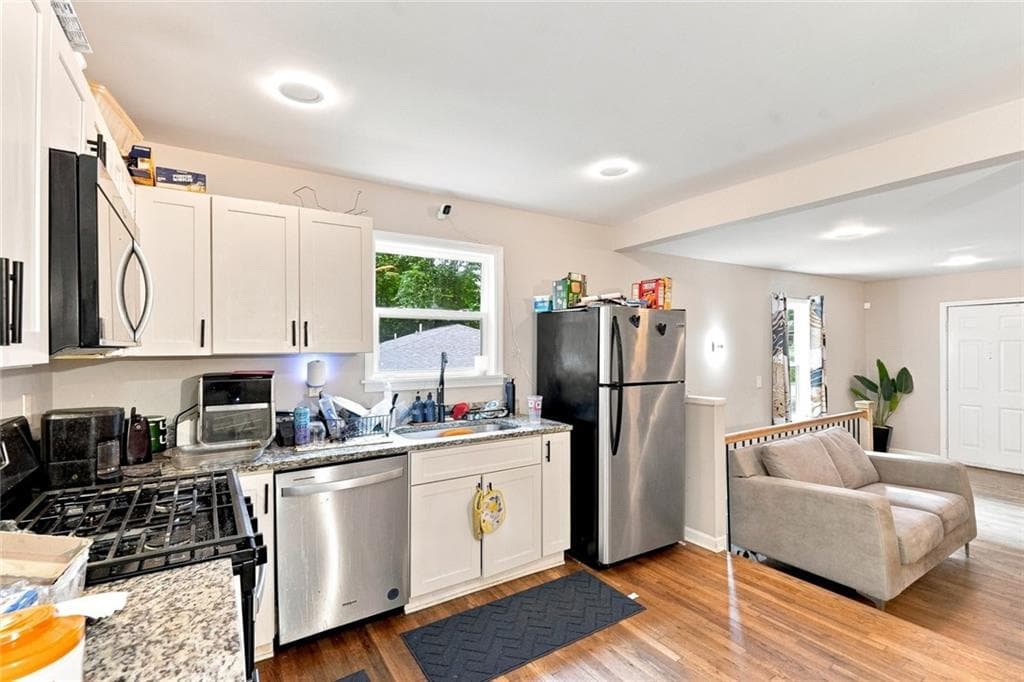 4 bedroom, 2 bathroom, 1,916 sq ft single family residence for sale at 2740 Dale Creek Drive, Atlanta, GA 30318 — photo 4