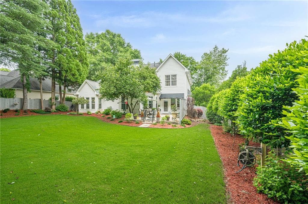4 bedroom, 3 bathroom, 2,919 sq ft single family residence for sale at 6685 Waterbury Way, Cumming, GA 30040 — photo 4