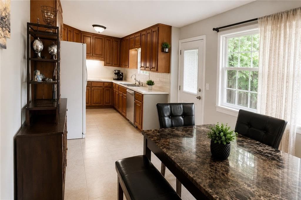 3 bedroom, 2 bathroom, 1,650 sq ft single family residence for sale at 1482 Hewatt Road, Lilburn, GA 30047 — photo 4