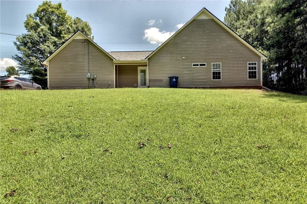 3 bedroom, 2 bathroom, 1,502 sq ft single family residence for sale at 5613 Highway 81, Mcdonough, GA 30252 — photo 3