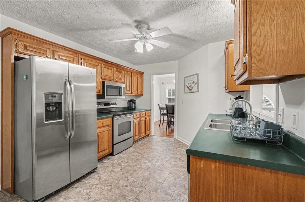 4 bedroom, 3 bathroom, 2,343 sq ft single family residence for sale at 352 Academy Woods Drive, Jefferson, GA 30549 — photo 2