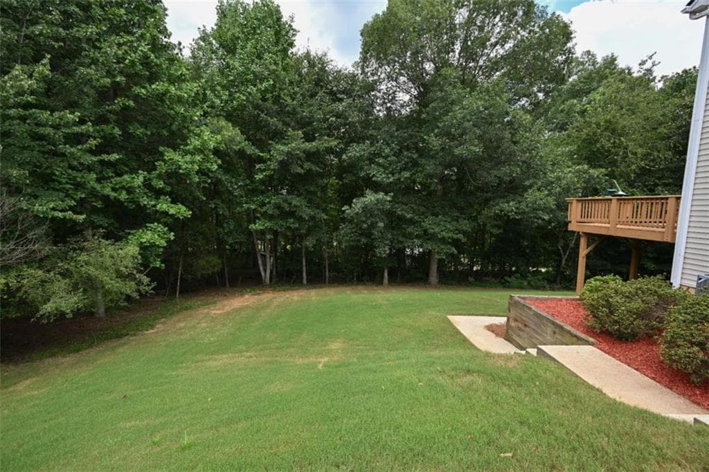 4 bedroom, 3 bathroom, 2,403 sq ft single family residence for sale at 529 Plantation Creek Drive, Loganville, GA 30052 — photo 4