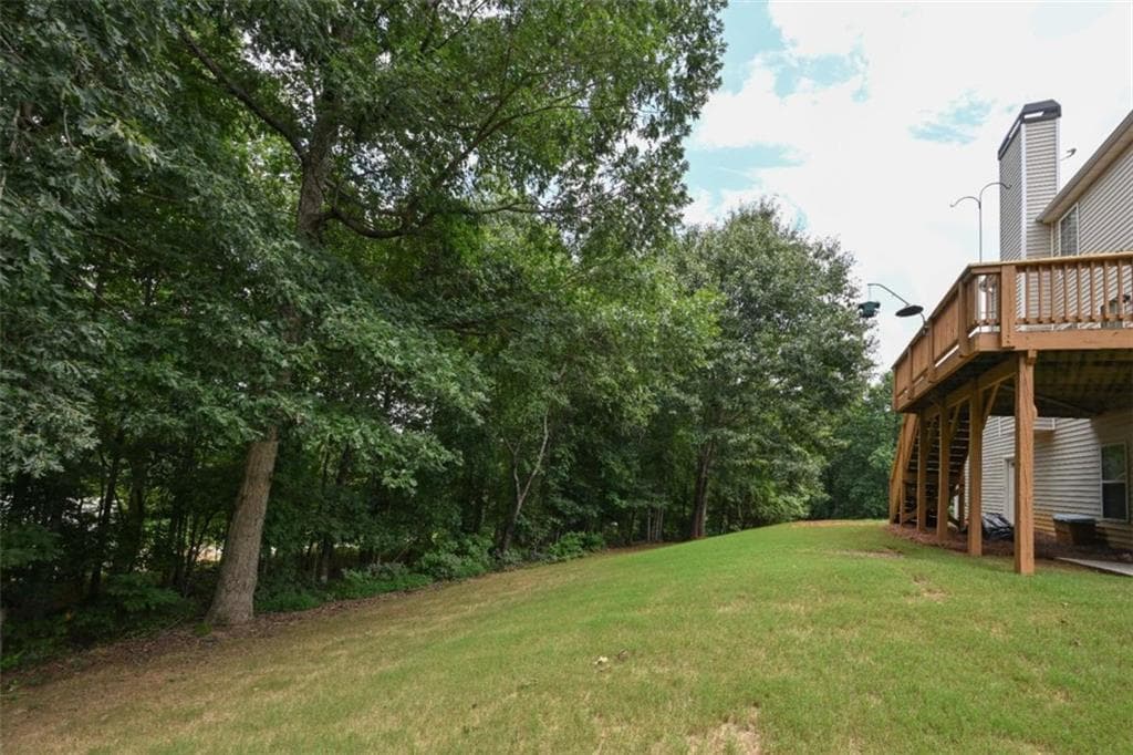 4 bedroom, 3 bathroom, 2,403 sq ft single family residence for sale at 529 Plantation Creek Drive, Loganville, GA 30052 — photo 7