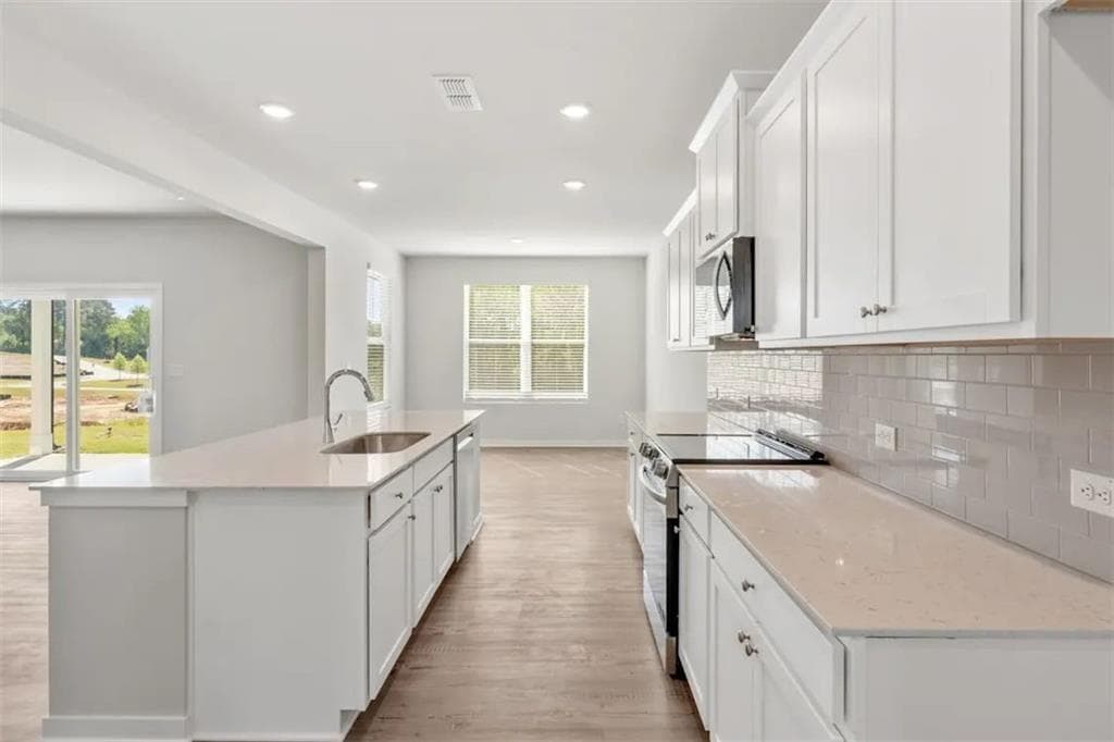 5 bedroom, 4 bathroom, 3,403 sq ft single family residence for sale at 5598 Rosehall Place, South Fulton, GA 30349 — photo 10