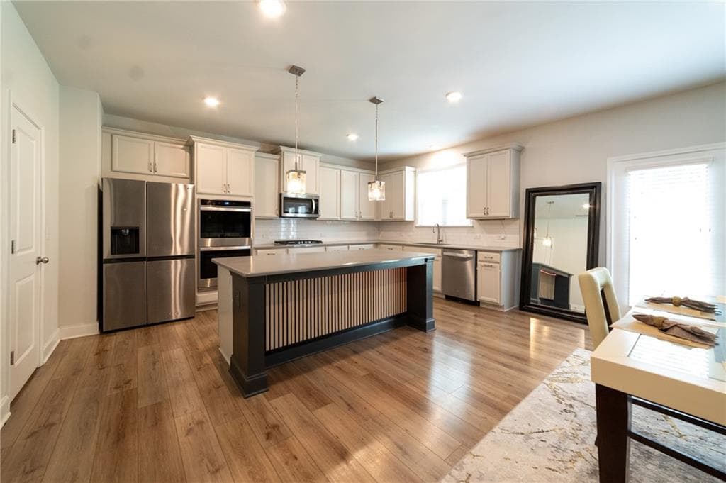 4 bedroom, 3 bathroom, 3,244 sq ft single family residence for sale at 4760 Holly Grape Drive, Atlanta, GA 30331 — photo 5