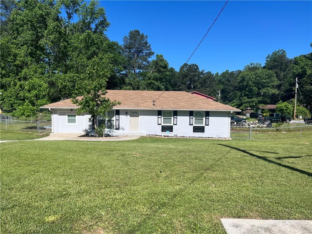 3 bedroom, 2 bathroom, 1,320 sq ft single family residence for sale at 2875 Carriage Lane, Atlanta, GA 30349 — photo 1 of 19