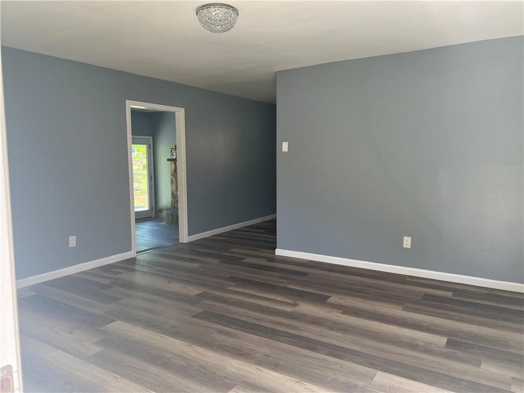 3 bedroom, 2 bathroom, 1,320 sq ft single family residence for sale at 2875 Carriage Lane, Atlanta, GA 30349 — photo 3