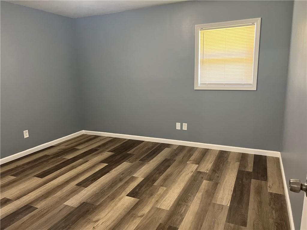 3 bedroom, 2 bathroom, 1,320 sq ft single family residence for sale at 2875 Carriage Lane, Atlanta, GA 30349 — photo 5