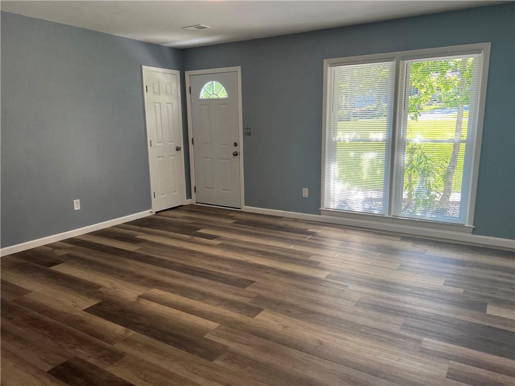 3 bedroom, 2 bathroom, 1,320 sq ft single family residence for sale at 2875 Carriage Lane, Atlanta, GA 30349 — photo 7