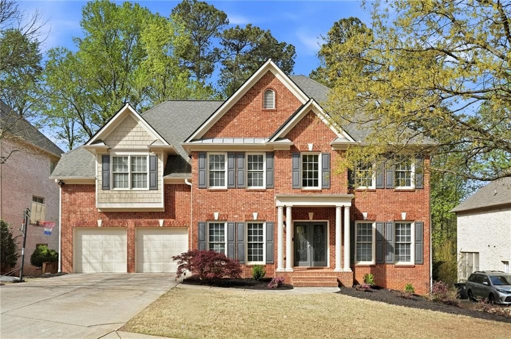 6 bedroom, 5 bathroom, 4,586 sq ft single family residence for sale at 3038 Willowstone Drive, Duluth, GA 30096 — photo 2