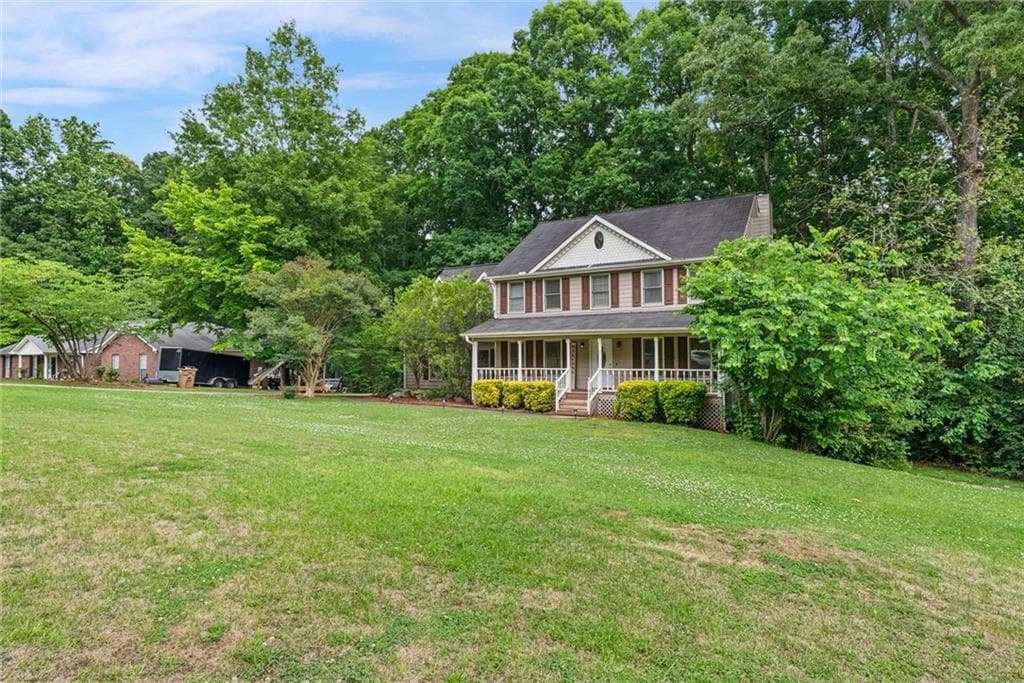 4 bedroom, 4 bathroom, 2,868 sq ft single family residence for sale at 165 Hayes Circle, Rex, GA 30273 — photo 2