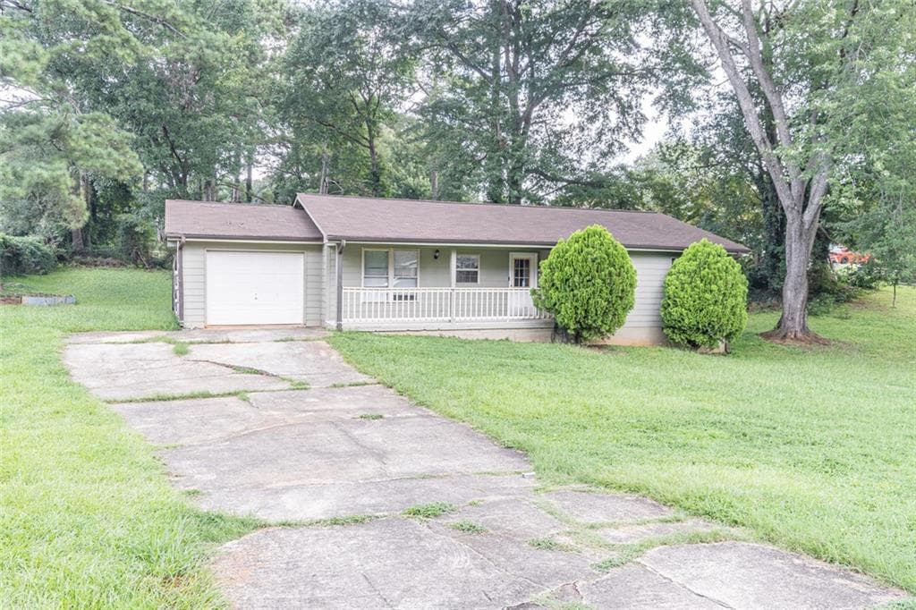 3 bedroom, 2 bathroom, 1,242 sq ft single family residence for sale at 950 Doeskin Drive, Conyers, GA 30012 — photo 2