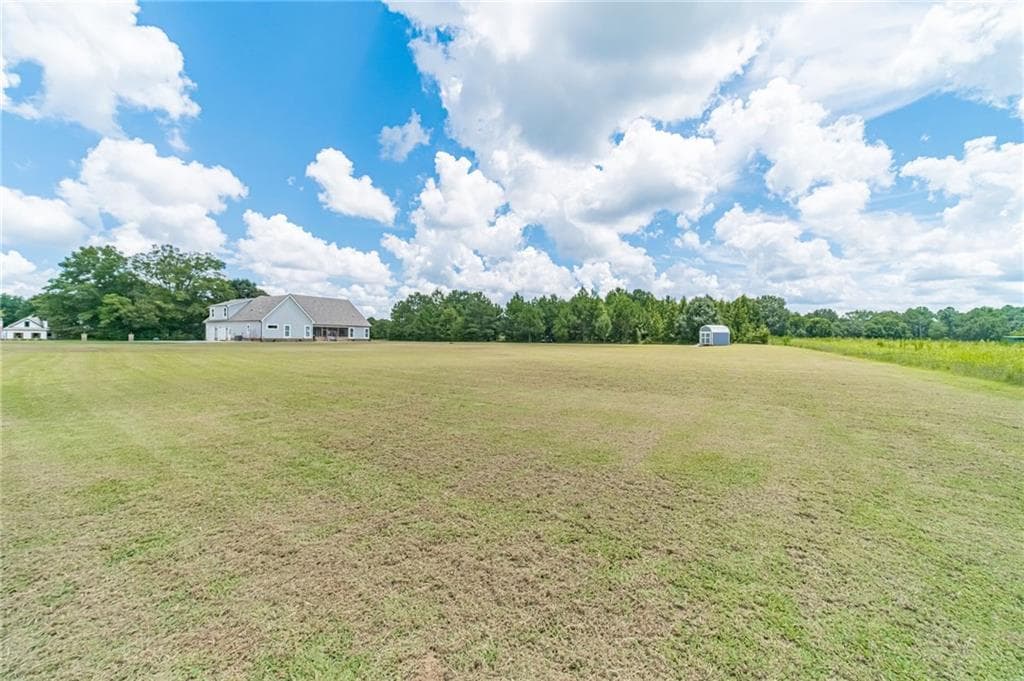 4 bedroom, 3 bathroom, 3,050 sq ft single family residence for sale at 302 Savannah Drive, Mansfield, GA 30055 — photo 3