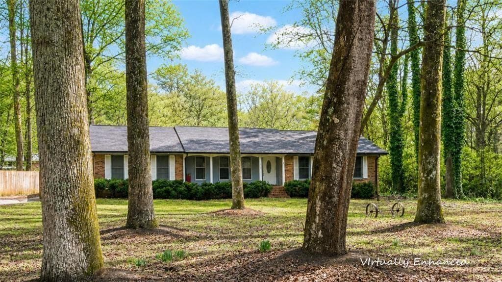 3 bedroom, 2 bathroom, 1,940 sq ft single family residence for sale at 2329 Valley Way, Snellville, GA 30078 — photo 1 of 11