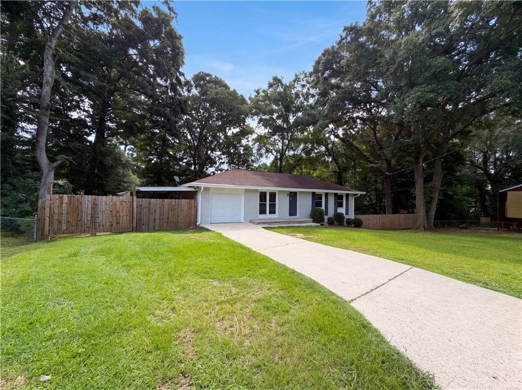 3 bedroom, 3 bathroom, 950 sq ft single family residence for sale at 6970 Mary Court, Riverdale, GA 30274 — photo 2