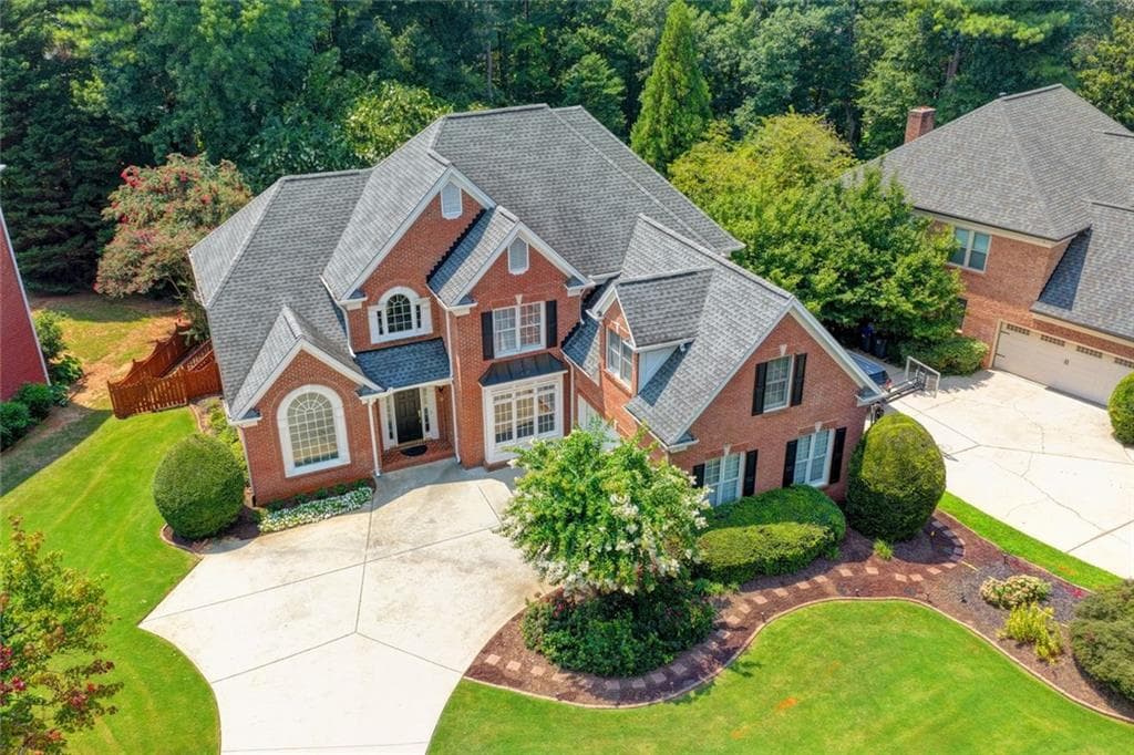 7 bedroom, 5 bathroom, 5,943 sq ft single family residence for sale at 3394 Forestwood Drive, Suwanee, GA 30024 — photo 2