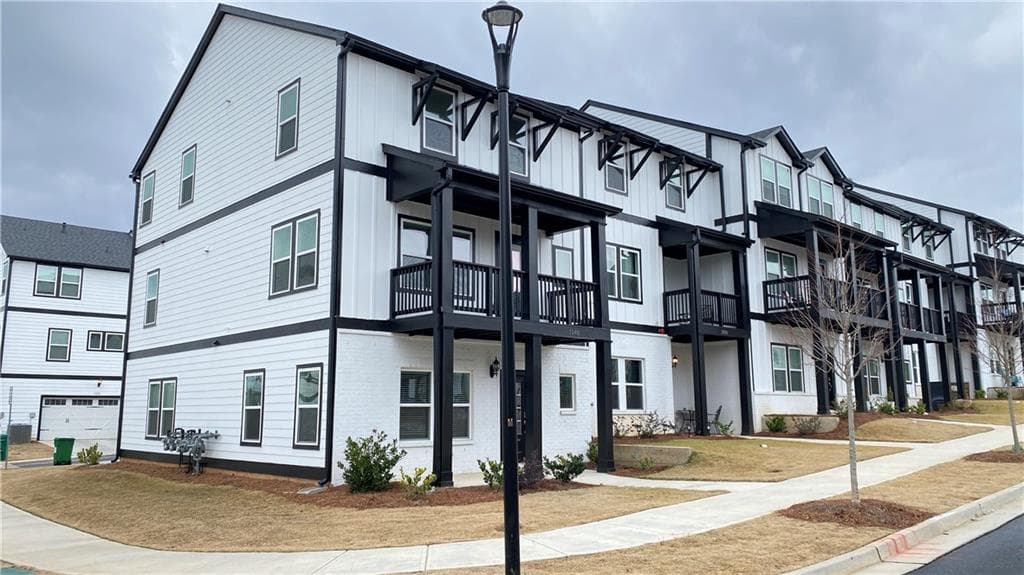 4 bedroom, 4 bathroom, 2,376 sq ft townhouse for rent at 1040 Knoxboro Lane, Woodstock, GA 30188 for $2,900 a month — photo 1 of 38