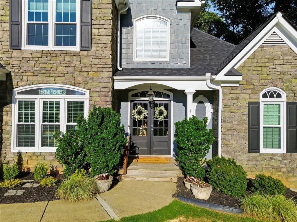 6 bedroom, 4 bathroom, 3,440 sq ft single family residence for sale at 406 Lovinggood Landing Drive, Woodstock, GA 30189 — photo 3