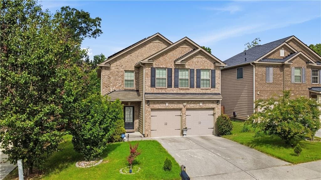 5 bedroom, 3 bathroom, 2,640 sq ft single family residence for sale at 7617 Bowhead Court, Fairburn, GA 30213 — photo 2